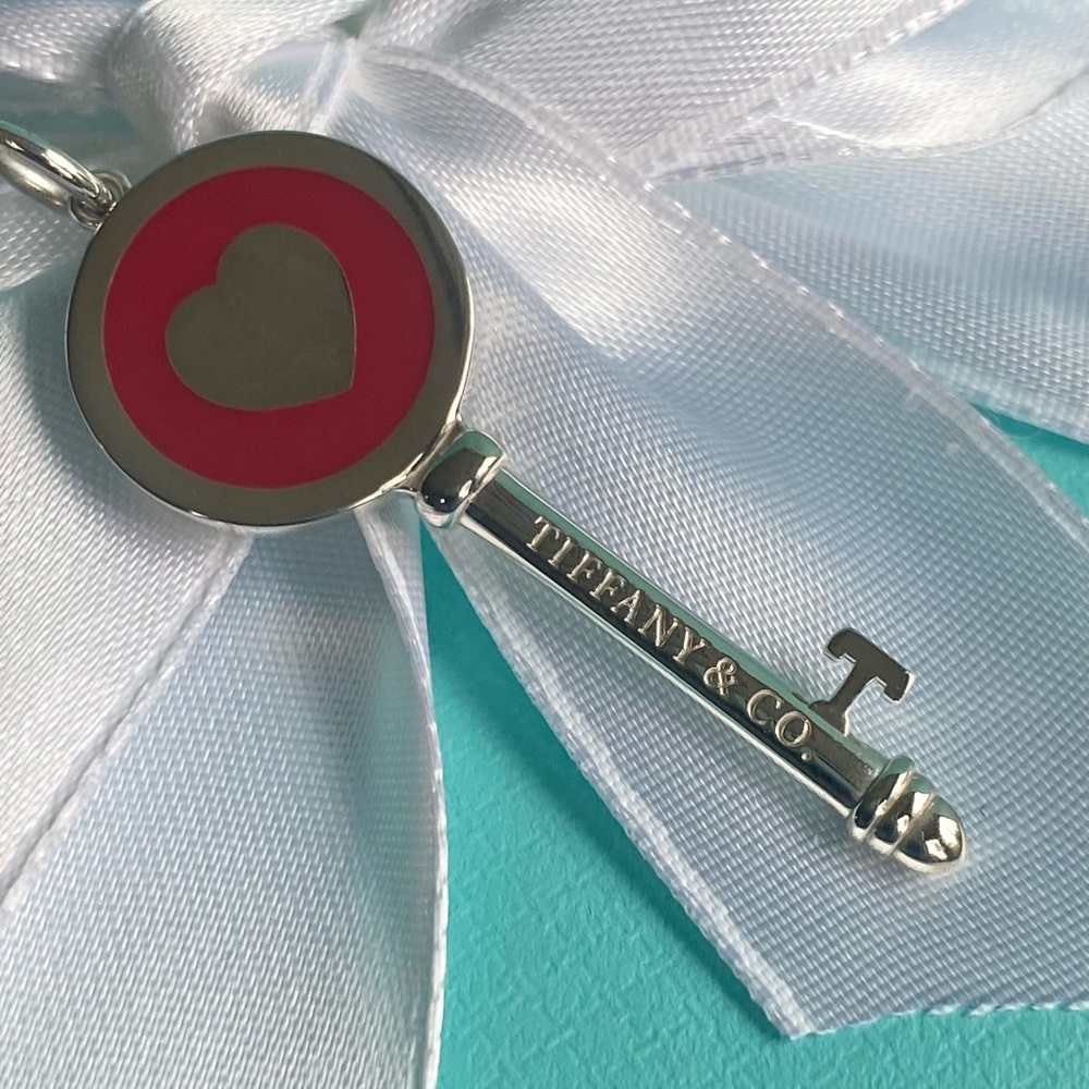 Tiffany & Co. New, Authentic, Sterling Silver Red Heart key.